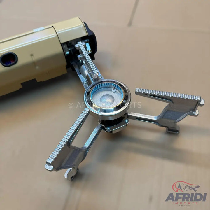 A portable, foldable camping stove with three extendable pot supports.