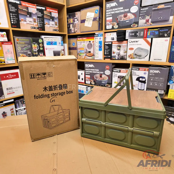 A collapsible olive green storage box with a wooden lid and carrying handles.