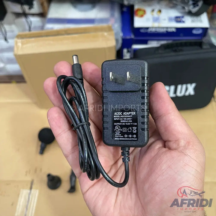 Black AC/DC adapter with a US plug and a barrel connector.