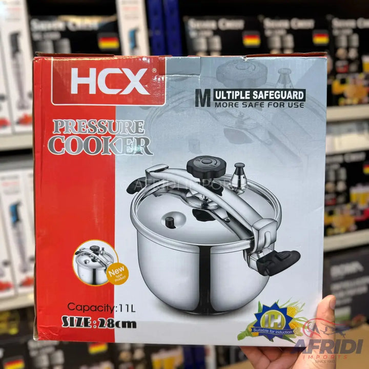 Silver HCX pressure cooker with an 11L capacity and 28cm size.
