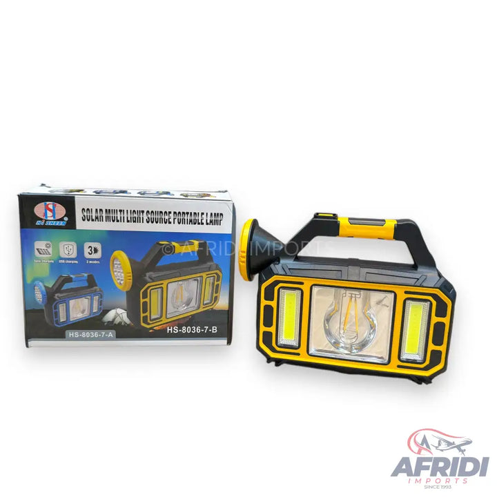 A solar multi-light source portable lamp with a black and yellow casing.