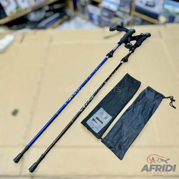 Two adjustable trekking poles with carry bags.
