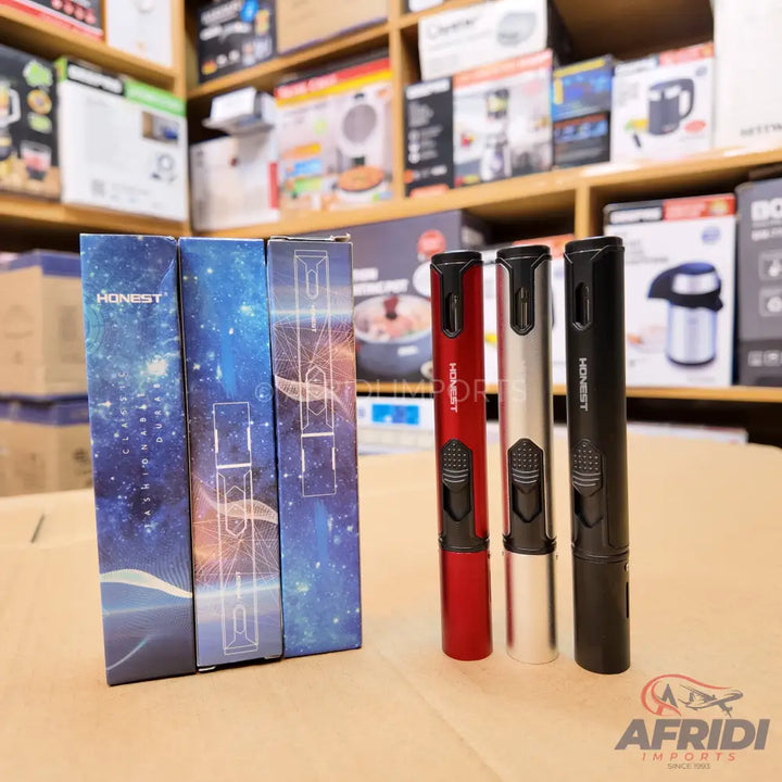 Three sleek, refillable torch lighters in red, silver, and black, alongside their galaxy-themed packaging.
