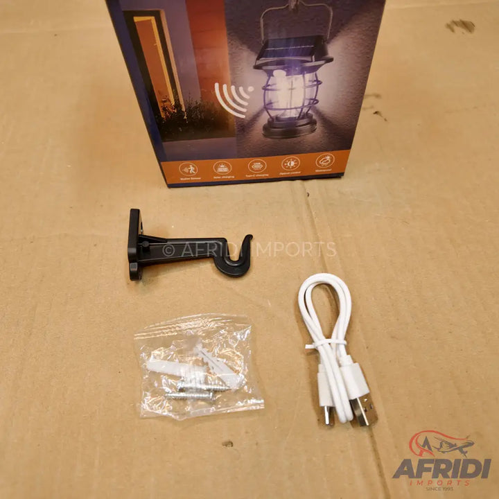 Outdoor solar-powered LED lantern with motion sensor.