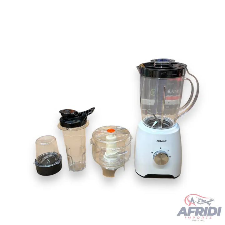 White blender with a clear pitcher, two additional blending cups, and a grinding attachment.