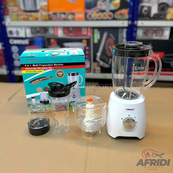 A white blender with multiple clear attachments and its product box.