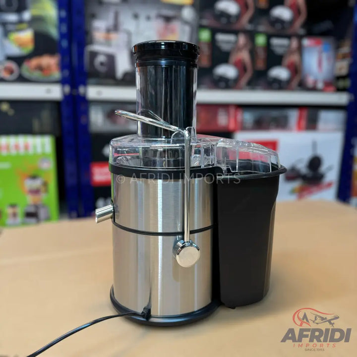A stainless steel centrifugal juicer with a black pulp container.