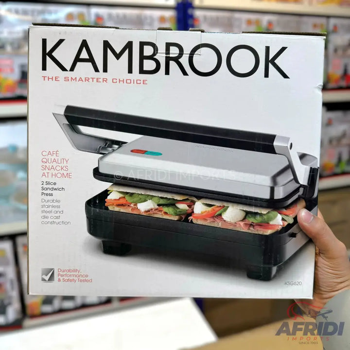 A Kambrook 2-slice sandwich press with a silver and black design.