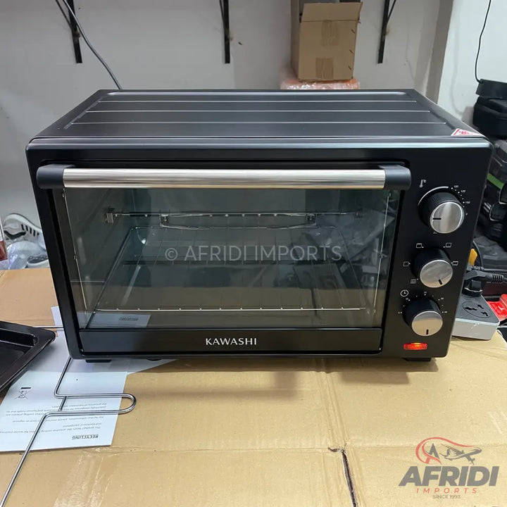 Black electric toaster oven with a clear glass door and three control knobs.