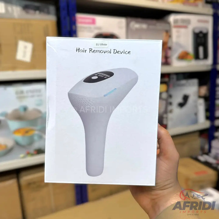 Boxed white hair removal device with a black display screen.