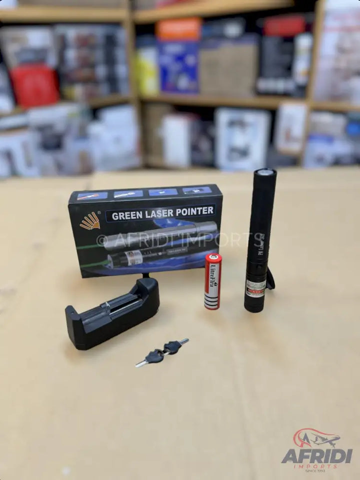 A green laser pointer set including a charger, battery, and safety keys.
