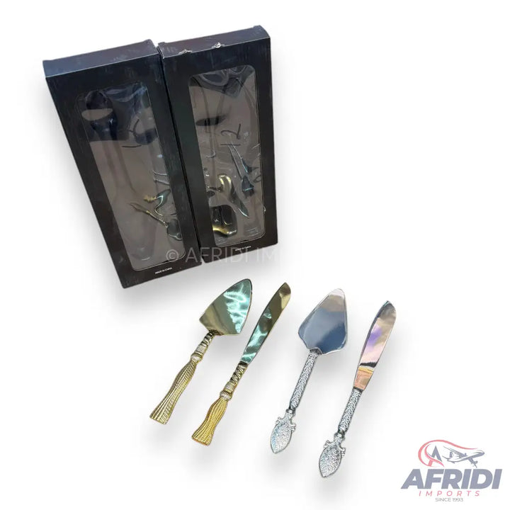Sets of cake servers and knives with decorative handles.