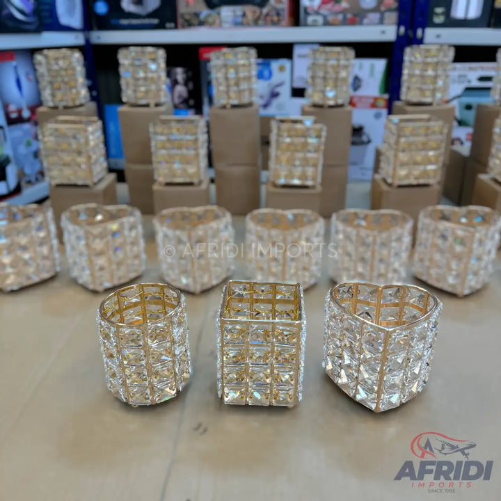 Sparkling crystal candle holders in various shapes.