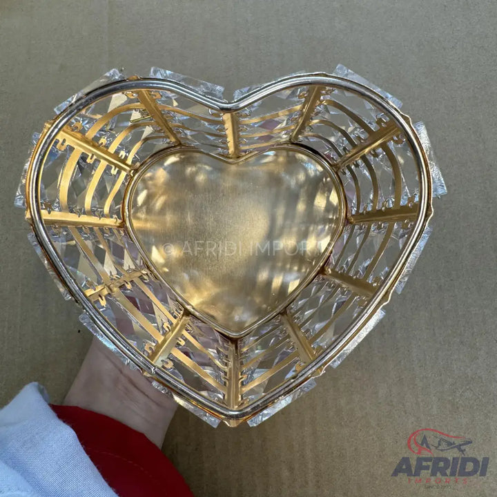 Heart-shaped decorative basket with gold and clear crystal accents.