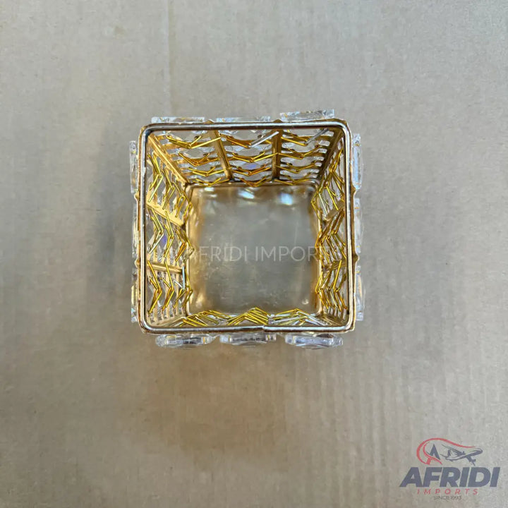Square gold and crystal decorative basket.
