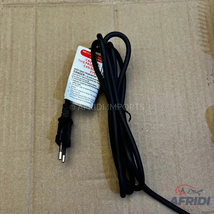 Black power cord with a three-pin plug and a warning label.