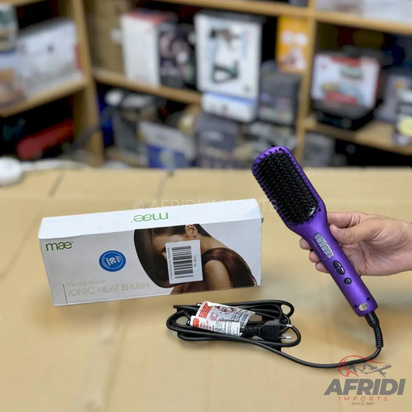 Purple electric hair straightening brush with a black power cord.
