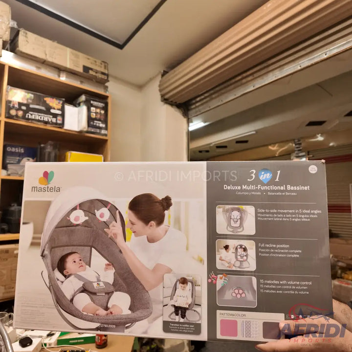 A 3-in-1 deluxe multi-functional baby bassinet in a box, featuring a side-to-side movement, full recline position, and 15 melodies with volume control.