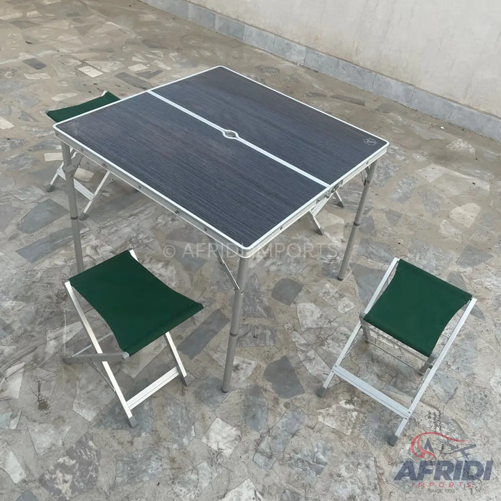 Portable folding table with two matching folding stools.