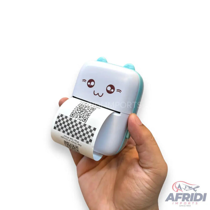 A portable, light blue and white thermal printer with a cute cartoon face, printing a receipt with a QR code and checkered pattern.
