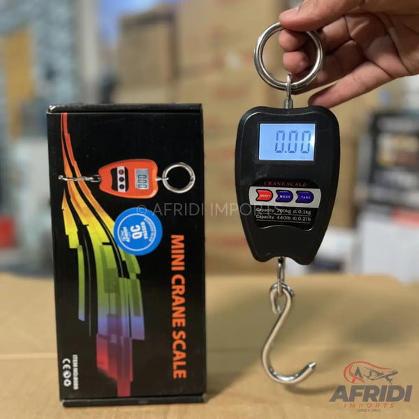 Black digital hanging scale with a metal hook.