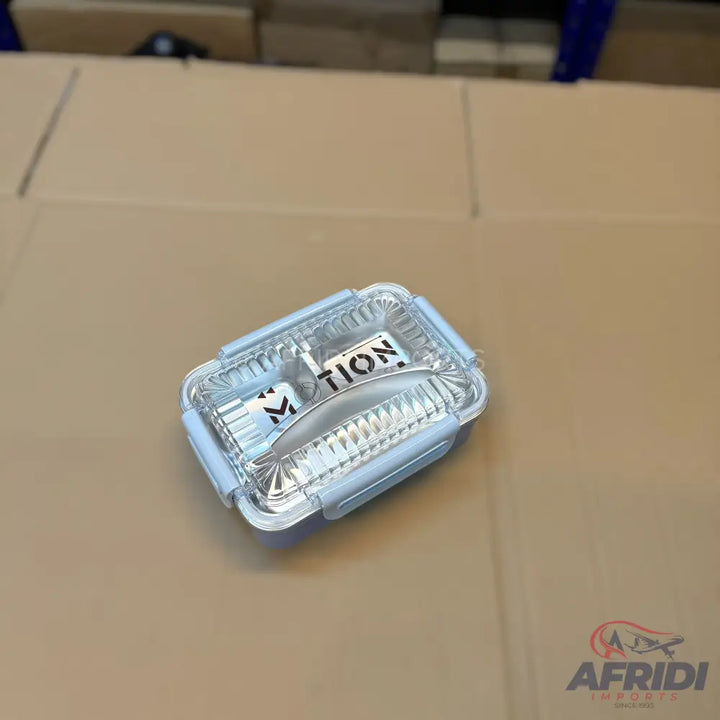 Clear plastic food container with light blue latches and a divided interior.