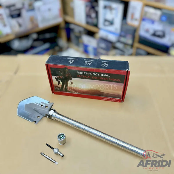 A multi-functional tactical engineer’s shovel with a compass and interchangeable bits.