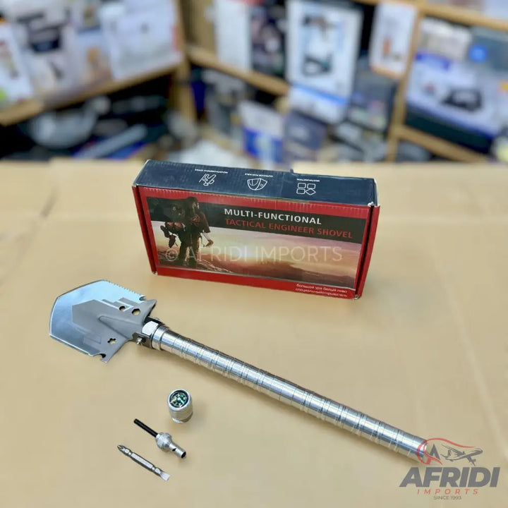A multi-functional tactical engineer’s shovel with a compass and interchangeable bits.