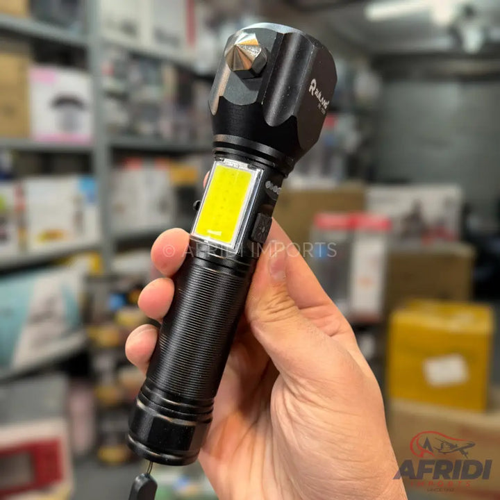 Black tactical flashlight with a side COB light and an adjustable head.