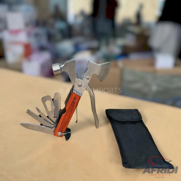 A multi-tool with a hammer, axe, and other foldable implements.