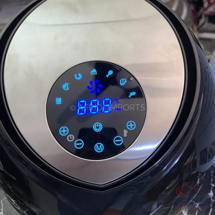 Digital display air fryer with preset cooking functions.
