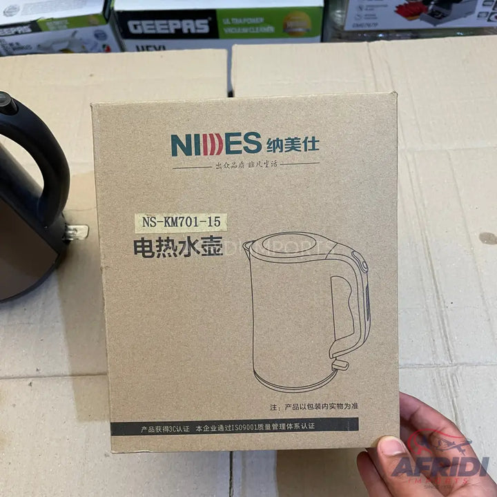 Brown cardboard box for an electric kettle.