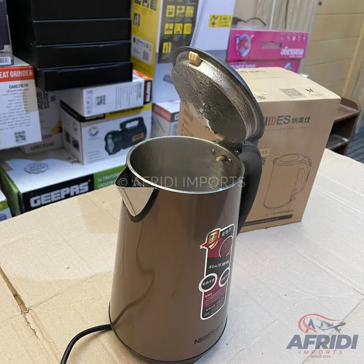 A brown electric kettle with its lid open.