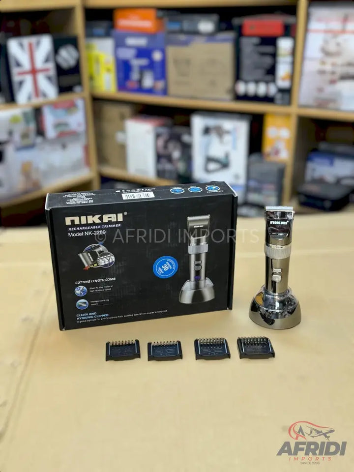 Nikai rechargeable hair trimmer with multiple guide combs and a charging stand.