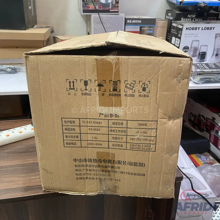 Brown cardboard box with product specifications and handling instructions.