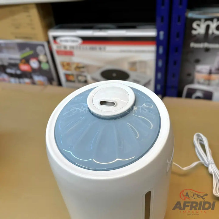 White and light blue cylindrical automatic soap dispenser with a clear window.