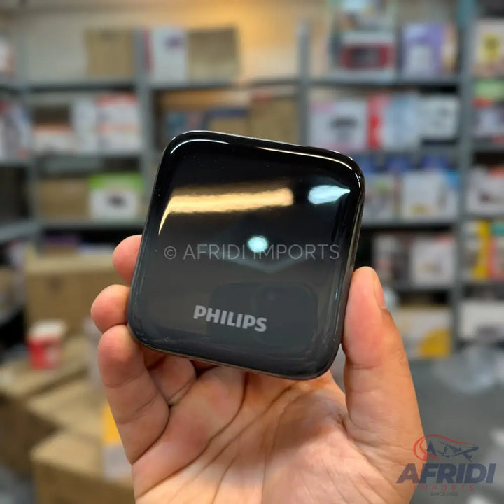 A black Philips power bank.