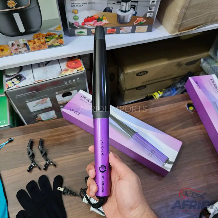 Purple and black hair curling wand with a tapered barrel.