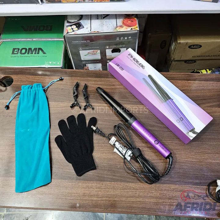 Purple hair curling wand with accessories.