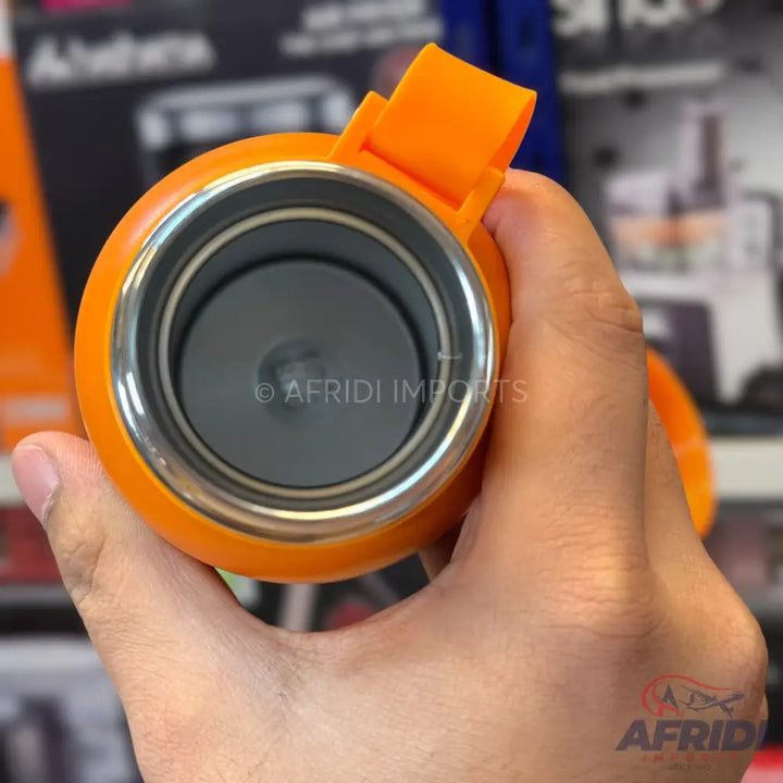 Orange thermal water bottle with a stainless steel interior.