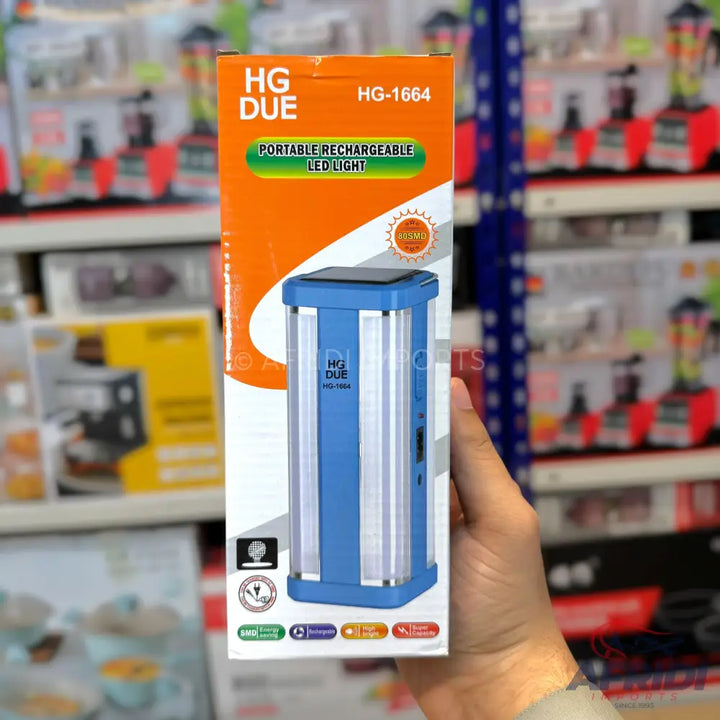 Blue and white portable rechargeable LED light with a solar panel.