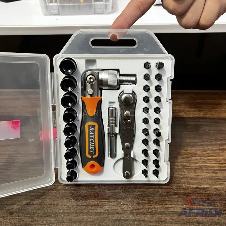 A compact ratchet and screwdriver bit set in a clear plastic case.