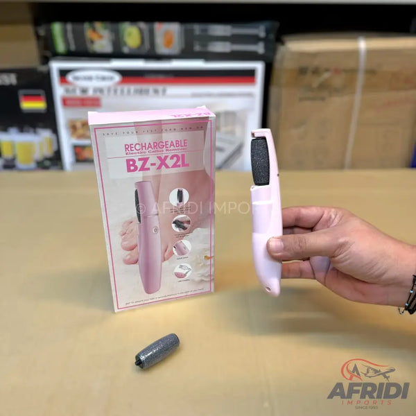 Pink rechargeable electric foot file with a rotating abrasive head.