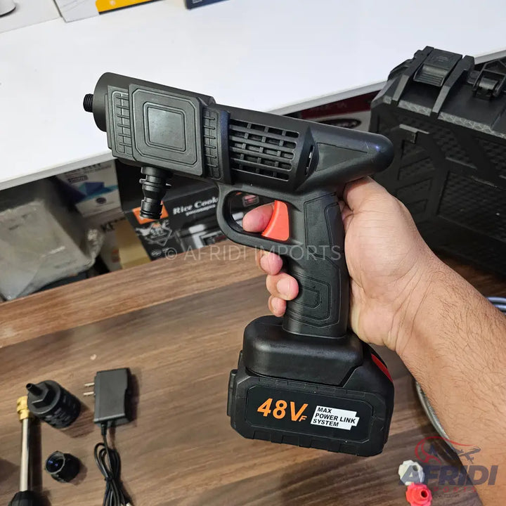 Cordless portable pressure washer with a 48V battery.