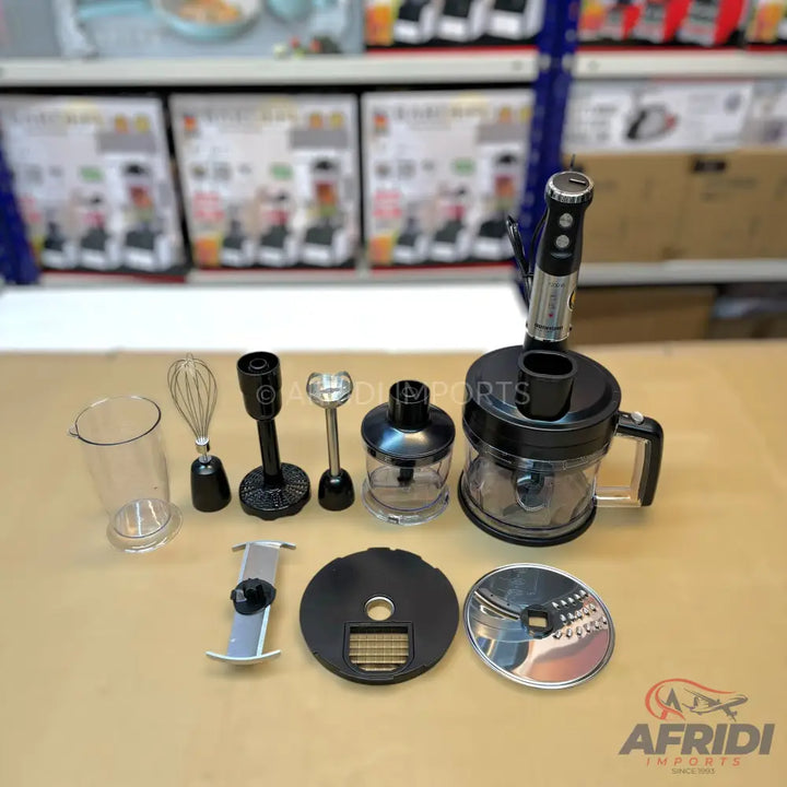 A disassembled black and clear multi-function hand blender and food processor set with various attachments.