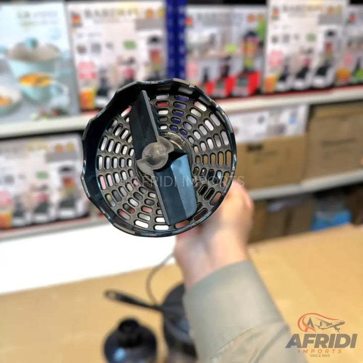 The blade and guard of an immersion blender, designed for blending and pureeing ingredients.