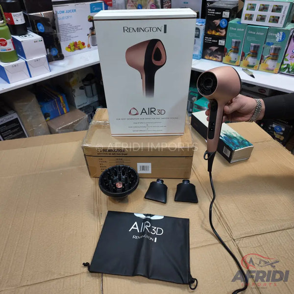 Rose gold and black Remington AIR3D hair dryer with accessories.