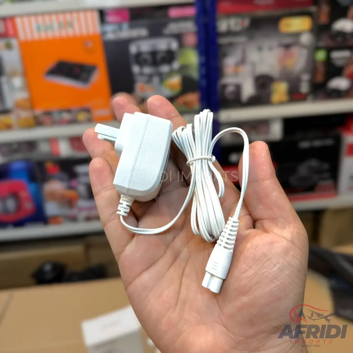 White two-pin power adapter with an attached cable ending in a two-slot female connector.
