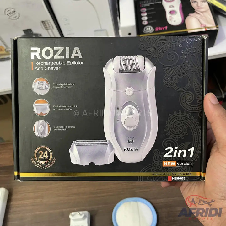Boxed silver 2-in-1 rechargeable epilator and shaver with various features.