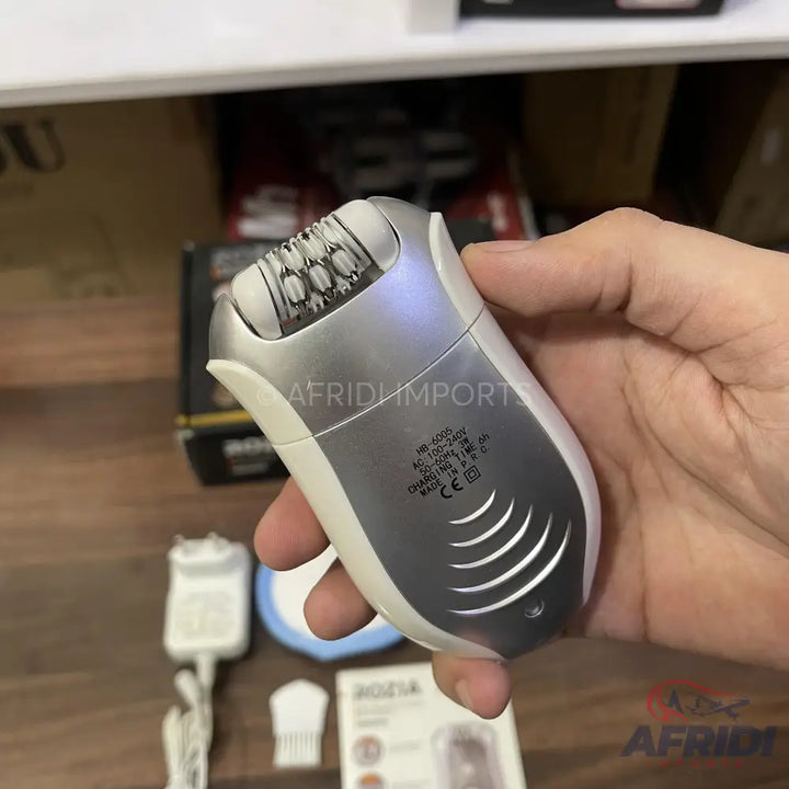 Silver and white cordless epilator with a multi-tweezer head.
